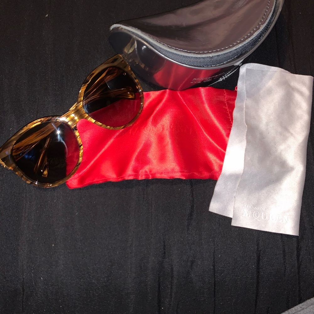 Alexander McQueen sunglasses with skulls on side